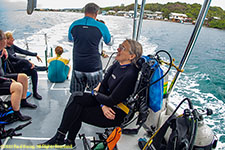 Charlotte on dive boat going out